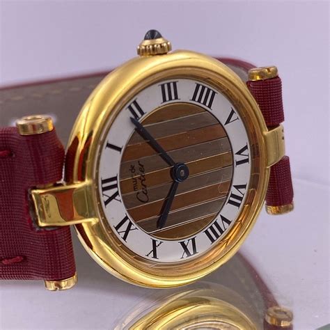 montre vintage cartier femme